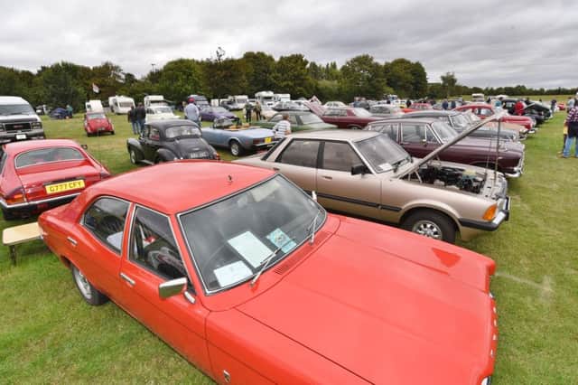 Classic car show on Peterborough Embankment. EMN-160409-181025009