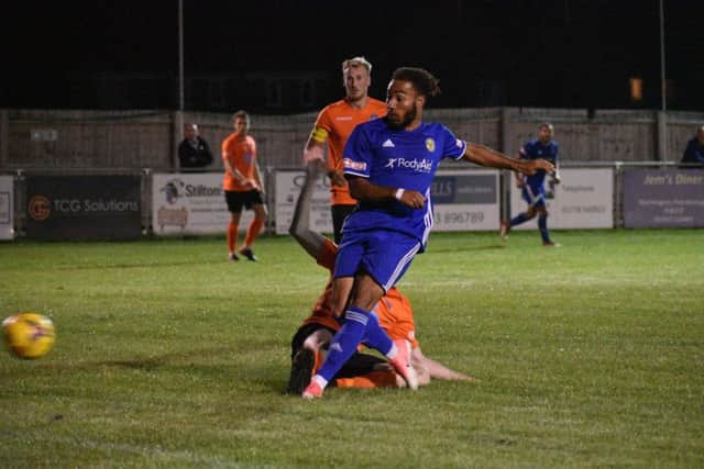 Josh McCammon opens the scoring for Peterborough Sports against Welwyn. Photo: James Richardson.