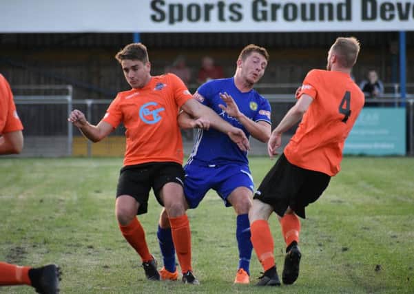 Action from Peterborough Sports' win over Welwyn. Sports are in blue. Photo: James Richardson.
