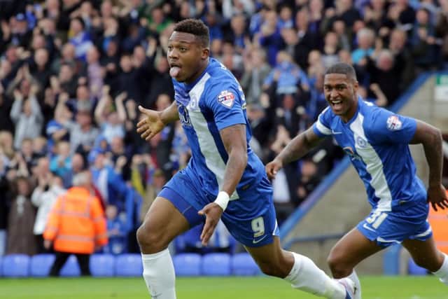 Britt Assombalonga helped Posh to a great start in the 2013-14 League One season.