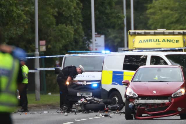 The scene of the crash in Bretton Way this afternoon. Photo: Terry Harris