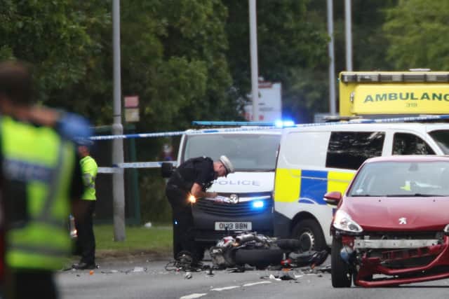 The scene of the crash in Bretton Way this afternoon. Photo: Terry Harris