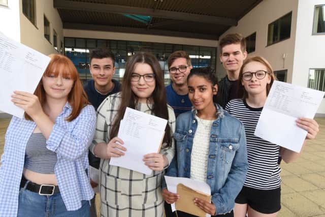 Pupils at Queen Katharine Academy receiving their results