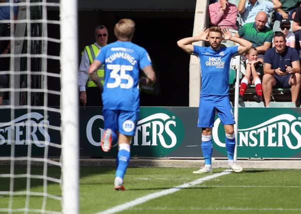Matt Godden of Peterborough United celebrates scoring the opening goal. Picture: Joe Dent