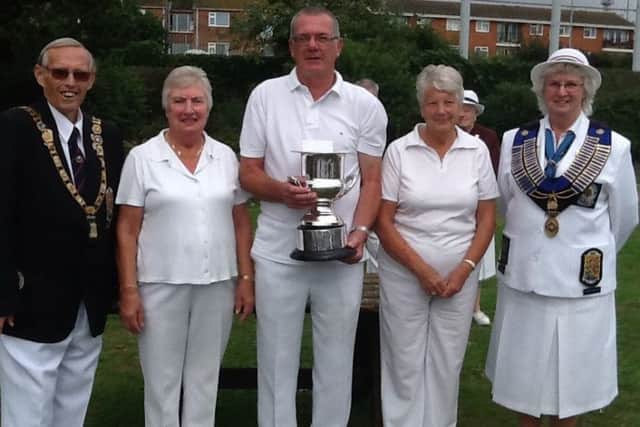 Winners of the non-championship Reg Jackson open triples tournament Graham Agger, Doris Flowers and Joan Padley with English Bowling Federation presidents Trevor Harris and Jean Phillips.