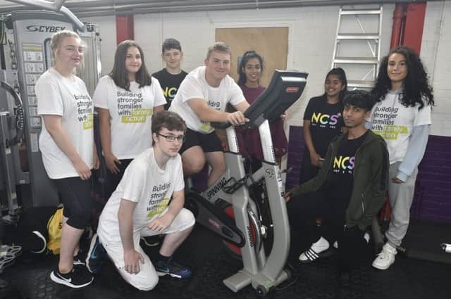 Youngsters from the NCS doing a sponsored cycle in aid of Family Action at the Fitness Station gym EMN-180821-085734009