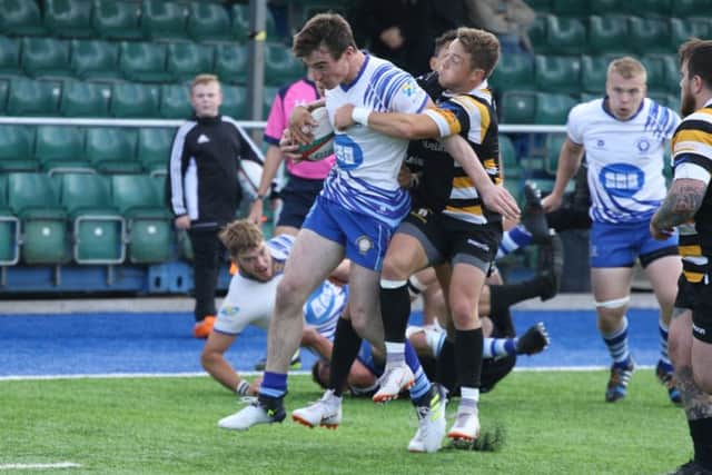 Rory White attacks for the Lions in last weekend's game against Welsh champions Merthyr. Picture: Mick Sutterby