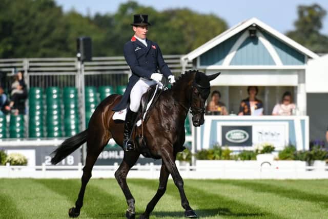 Oliver Townend  in dressage action.