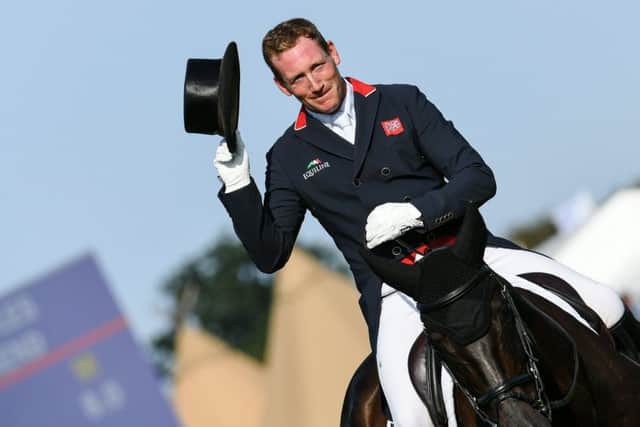Oliver Townend riding MHS King Joules during the dressage phase of the Land Rover Burghley Horse Trials in the grounds of Burghley House near Stamford.