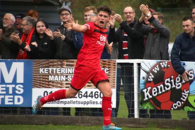 Mathew Stevens celebrates scoring for Kettering last season.