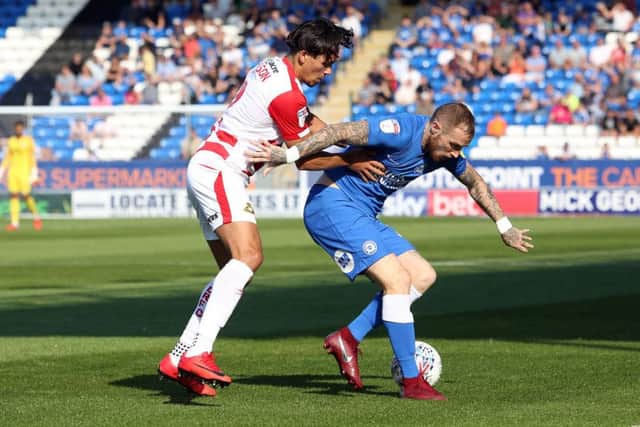 Marcus Maddison of Peterborough United holds off Niall Mason of Doncaster Rovers - Mandatory by-line: Joe Dent/JMP - 01/09/2018 - FOOTBALL - ABAX Stadium - Peterborough, England - Peterborough United v Doncaster Rovers - Sky Bet League One