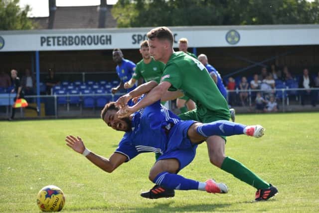 Josh McCammon makes a tackle for Peterborough Sports in their Evo Stik League win over Kidlington. Photo: James Richardson.