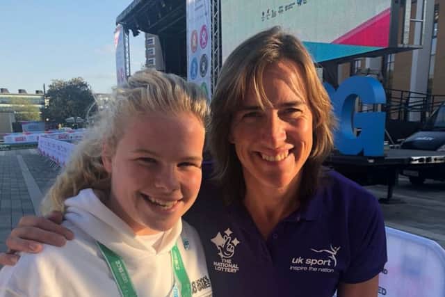 Holly Leggott received her medal from Dame Katherine Grainger.