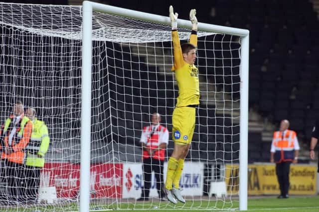 Posh 'keeper Conor O'Malley during the penalty shootout at MK Dons. Photo: Joe Dent/theposh.com.