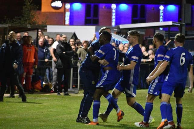 Peterborough Sports players celebrate during their thrilling 4-3 FA Cup replay win over Stamford AFC. Photo: James Richardson.