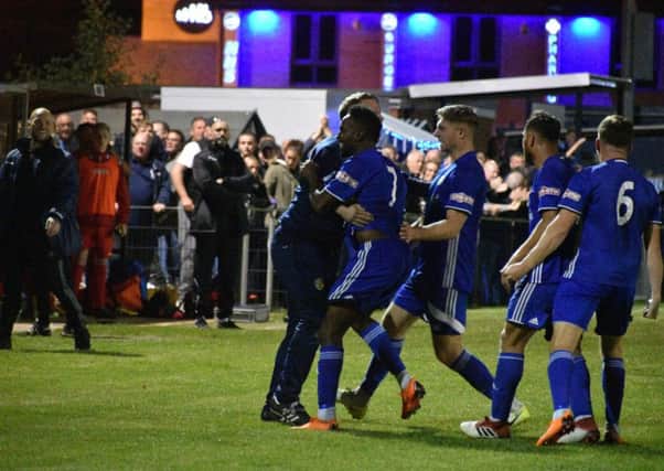 Peterborough Sports players celebrate during their thrilling 4-3 FA Cup replay win over Stamford AFC. Photo: James Richardson.
