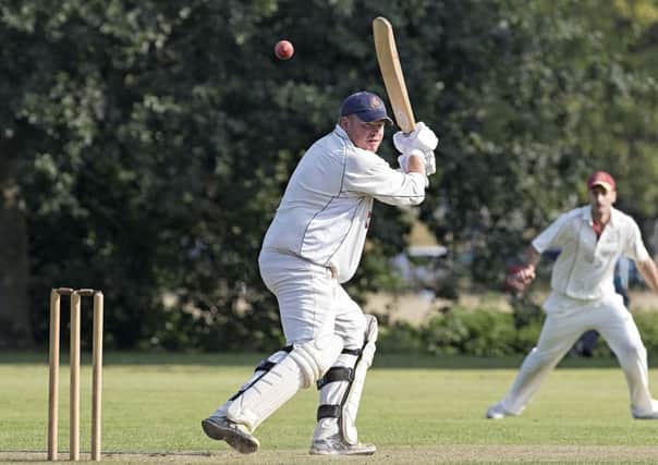 Gary Freear during his innings of 131 not out for Wisbech against March. Photo: Pat Ringham.