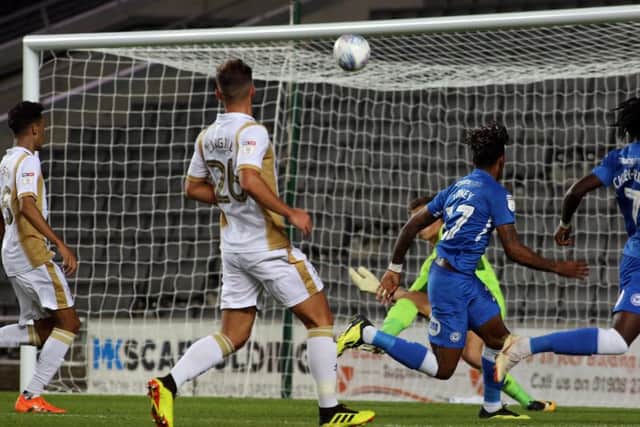 Ivan Toney misses a chance for Posh at MK Dons.