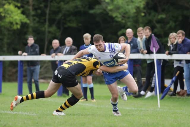 Ashley Hill on the attack for the Lions against Hinckley. Picture: Mick Sutterby