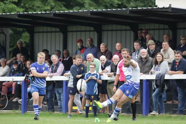 Ben Young kicks for goal for the Lions against Hinckley. Picture: Mick Sutterby