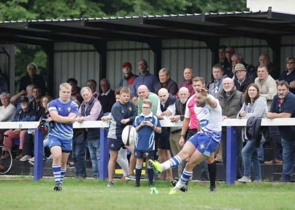 Ben Young kicks for goal for the Lions against Hinckley. Picture: Mick Sutterby