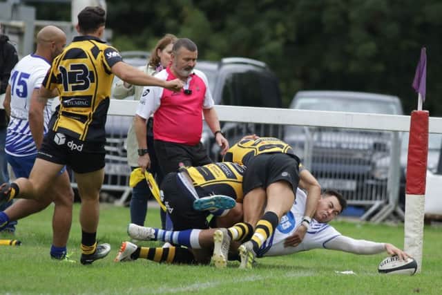 Kaz Henderson touches down for the Lions. Picture: Mick Sutterby