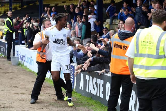 Posh striker Ivan Yoney celebrates his winning goal at Southend with the visiting fans. Photo: Joe Dent/theposh.com.