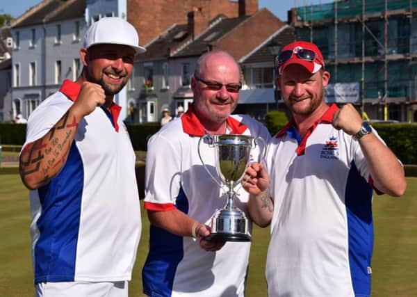Morton brothers Ean (left) and Tristan (right), pictured celebrating their British triples win with Mike Robertson, have been invited to attend England  senior trials.