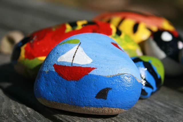 Painting pebbles - a new craze for kids