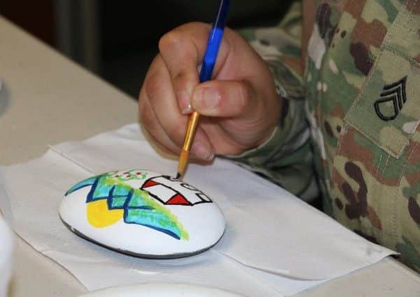 Painting pebbles - a new craze for kids