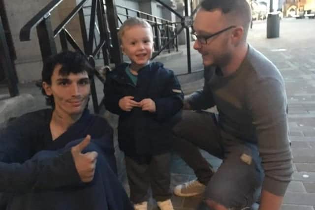Lincoln and Jamie Hanley with a rough sleeper in Peterborough