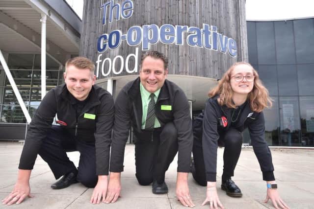 Craig Stafford with his son, Troy-Lee and daughter, Daisy-May, who will be running together to raise funds for Dementia UK in the Rutland Half Marathon on Sunday 16 September