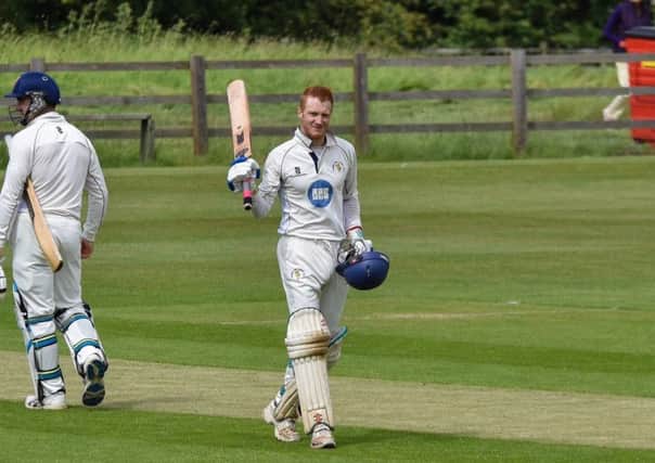 Michael Hobbiss celebrates his innings of 195 for Burghley Park against Great Houghton.