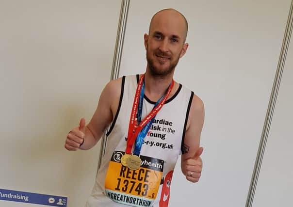 Reece Hill after completing his half-marathon