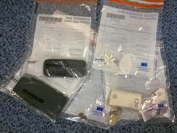 The drugs, mobile phone and cash seized by police