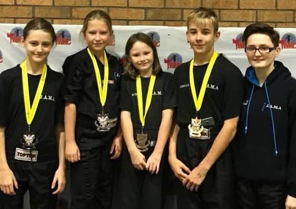 Pictured left to right at the FSK National Championships are Mia Edwards, Alex Langham, Autumn May, Kieran Ebbage and instructor Lianne Jones.