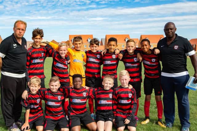 Park Farm Pumas Blue Under 12s are pictured before their 2-1 defeat by Wittering Harriers. Their team was Dylan Barker, Toby Hill, Cezary Kedzierdski, Keir Norman, Joshua-James Rawles, Max Smith, Bailey Williams, Adam Woolner-Marshall, Kacper Wrotniak, Moses Egbo,   Kevin Quansah and Alex Turlakov.