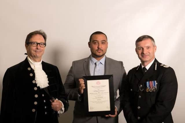 James Nessa collects his award