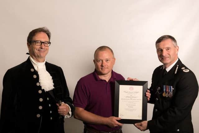 Martin Keene gets his award
