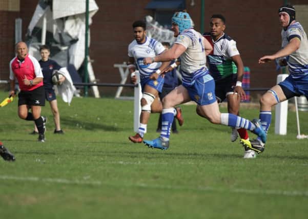Jack Askham runs in a try for Peterborough Lions. Picture: Mick Sutterby