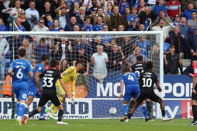 Jamal Lowe (10) scores Portsmouth's second goal at Posh. Photo: Joe Dent/theposh.com.