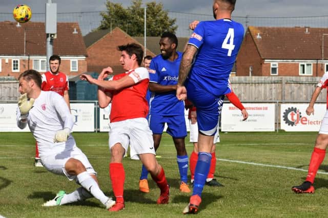 Paul Malone of Peterborough Sports shoots over the bar against Didcot Town. Photo: James Richardson.