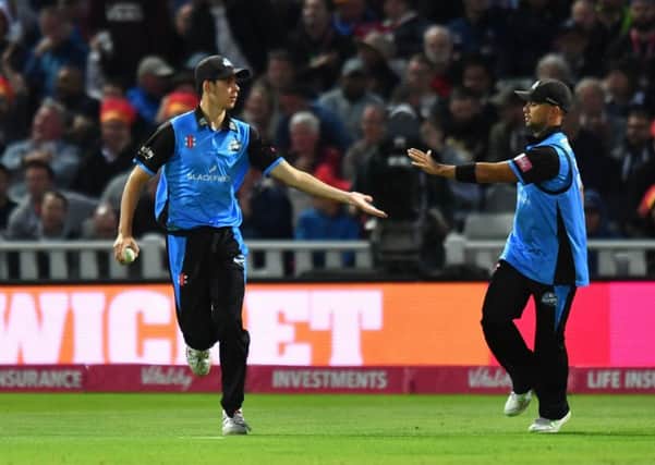 Patrick Brown (left) after taking a catch in the T20 Blast FInal.