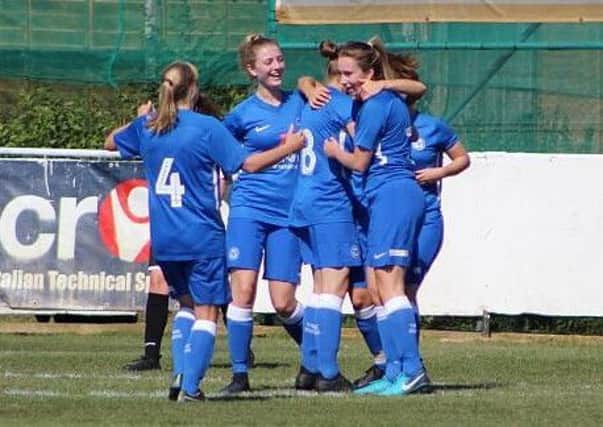 Posh Ladies celebrate a goal. Picture: Gary Reed