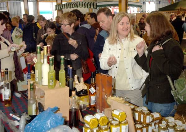Visitors to the East Midlands Food Festival in Melton enjoy the event last year EMN-180829-142229001
