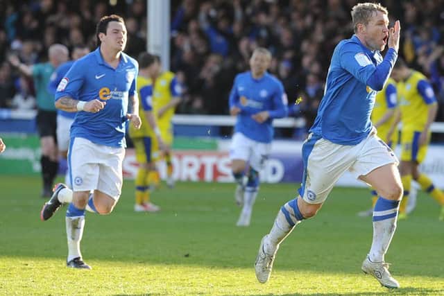 Grant McCann celebrates his goal for Posh against Sheffield Wednesday in April, 2013.