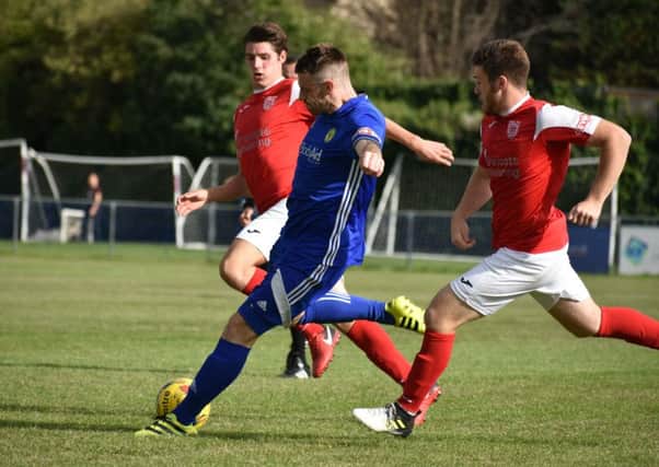Former Boston United player Josh Moreman in action for Peterborough Sports against Didcot Town.