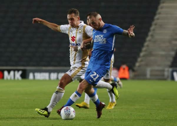 Marcus Maddison has yet to make a Posh start in League One this season.