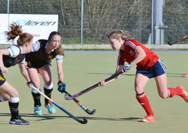 City of Peterborough Ladies skipper Robyn Gribble (red) in action.