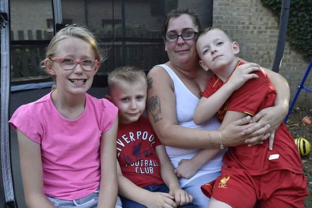 St Michael's Gate resident Nicci Wells with her children Megan (10), Ethan (6) and Hayden (7). EMN-180918-091324009